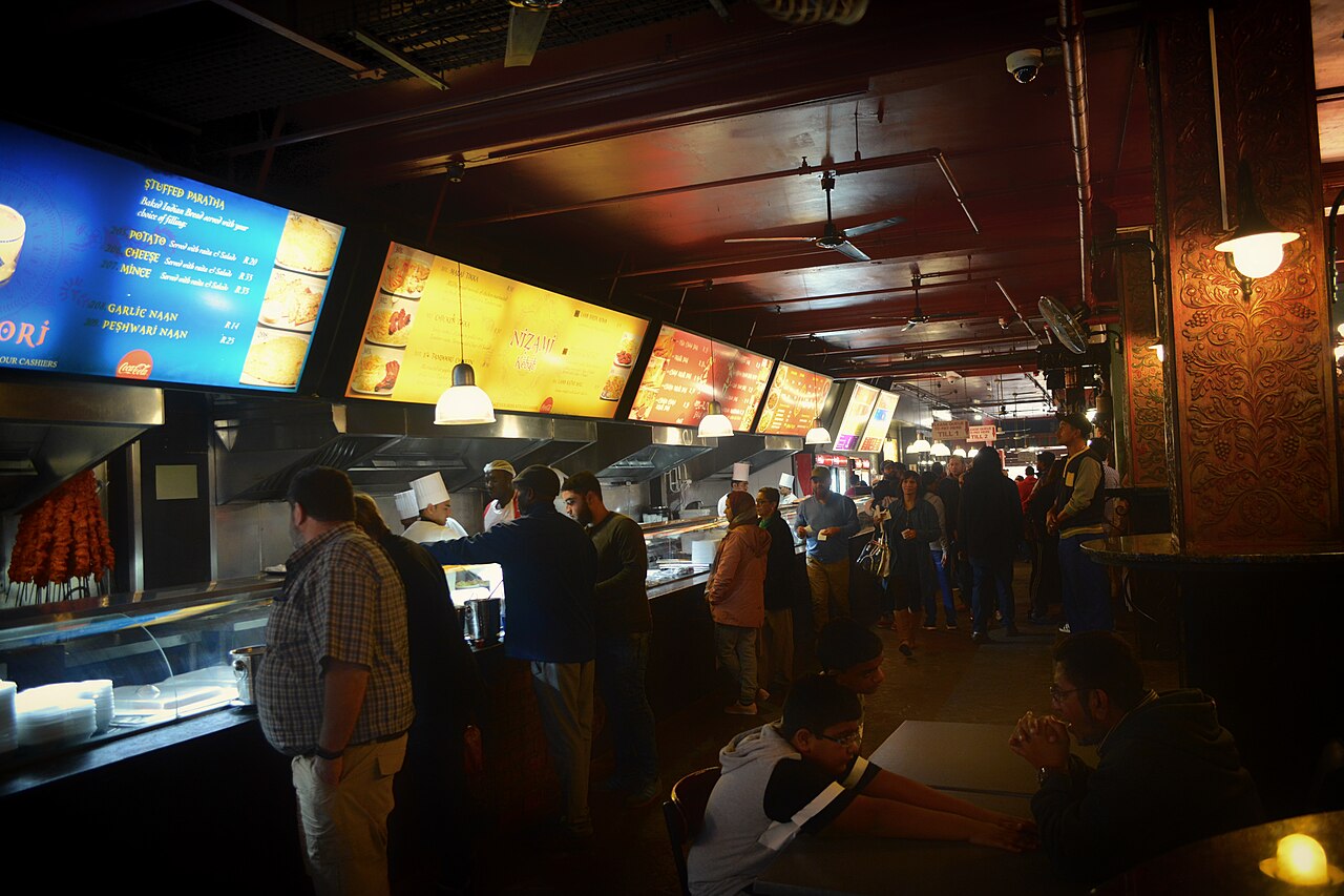 Food counters and seating at Eastern Food Bazaar in Cape Town