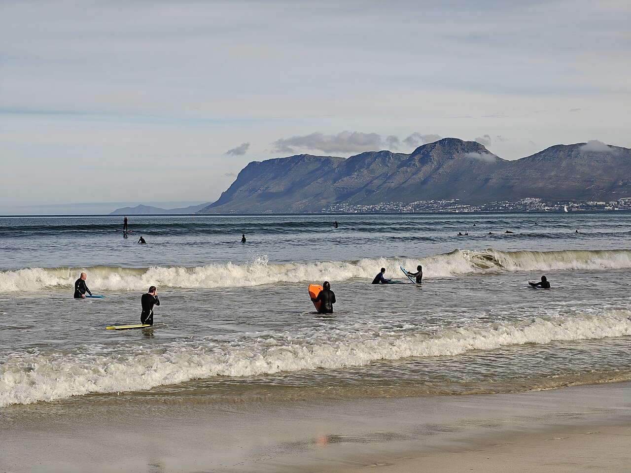 Surfers at Muizenberg Beach Surfers at Muizenberg Beach