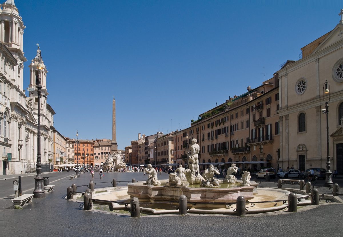 Piazza Navona with its fountain, church facade and surrounding buildings