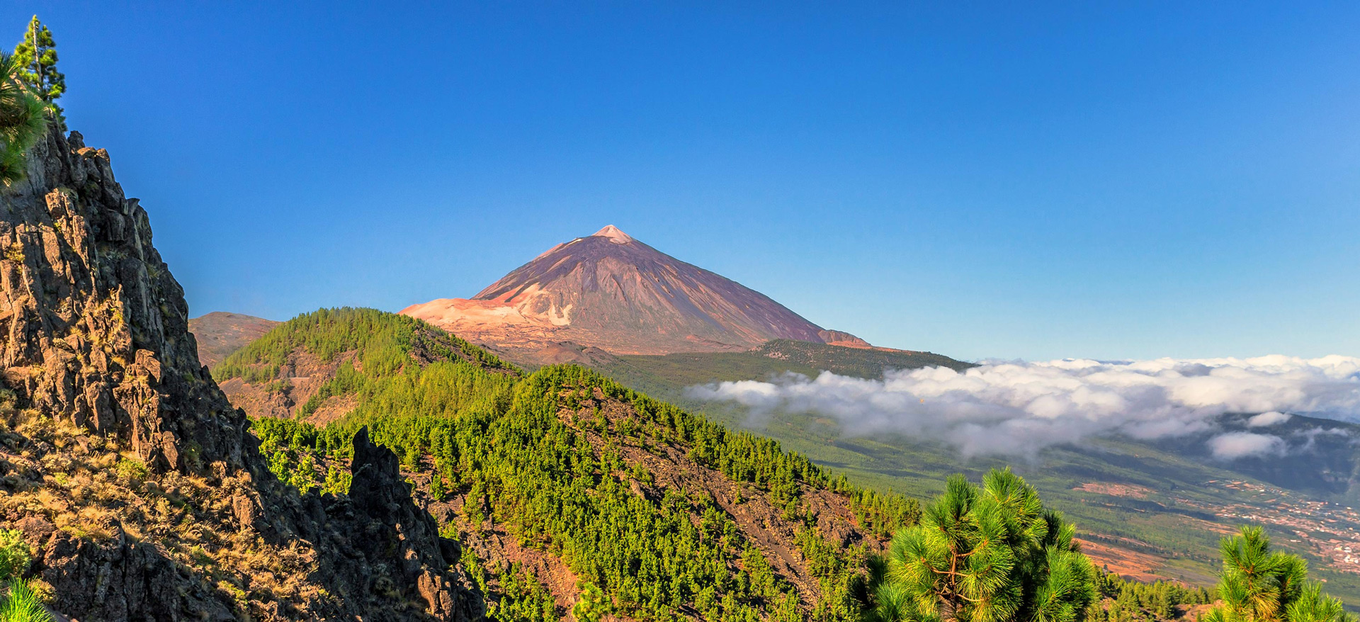 Mount Teide peak rising above the clouds in Tenerife