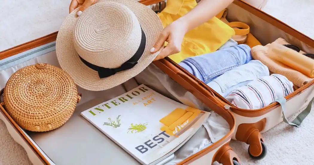 Packing for the Canary Islands Beach essentials and hat packed for Canary Islands trip