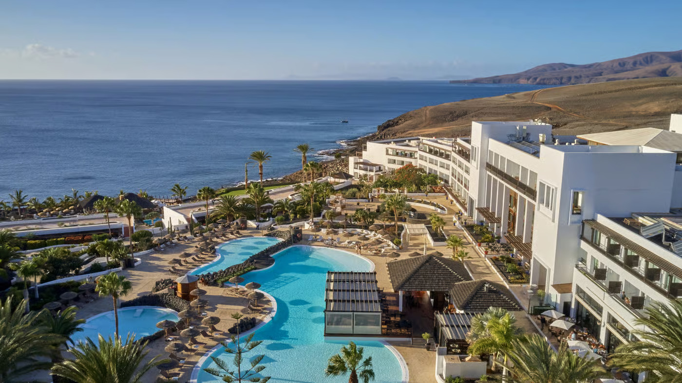 Luxury beachfront resort in the Canary Islands overlooking turquoise ocean