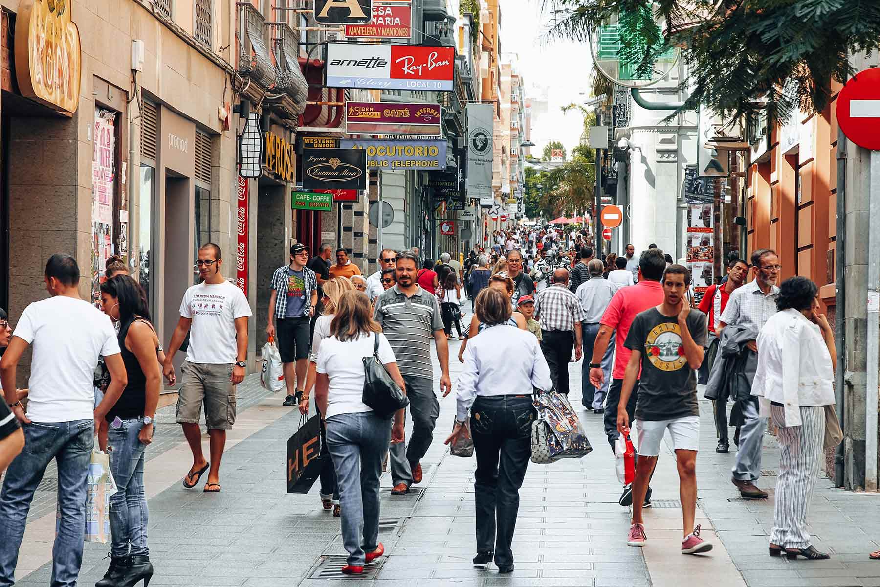 Busy shopping street with local shops in the Canary Islands