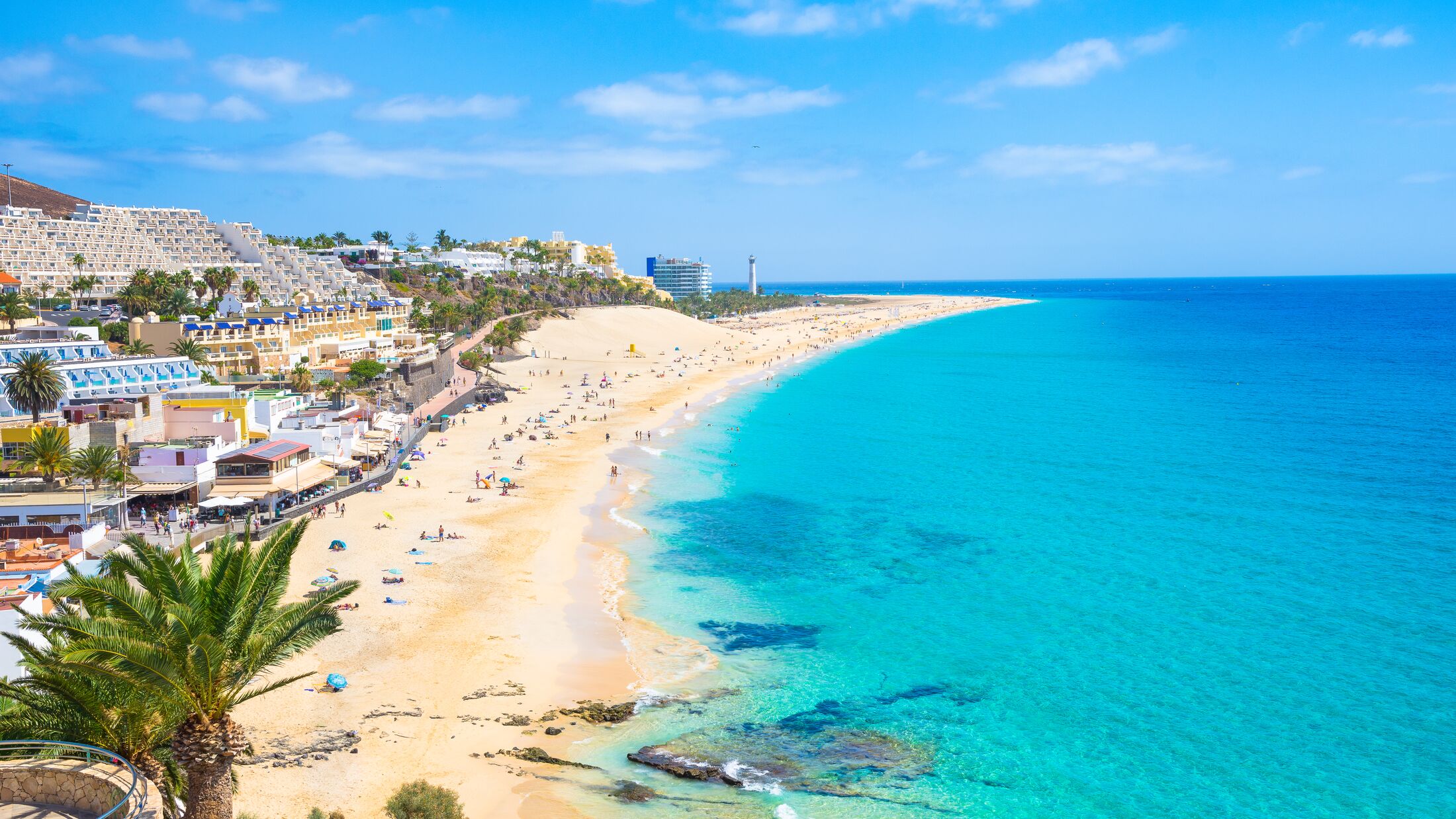 Turquoise lagoon beach in Fuerteventura with shallow clear water