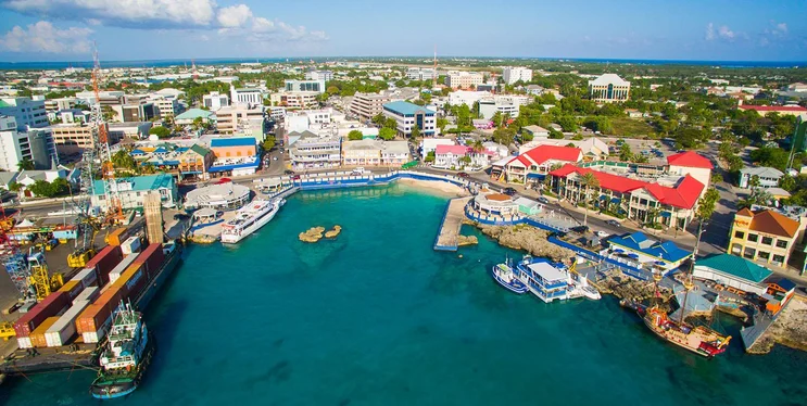 Top Destinations in the Cayman Islands – George Town Waterfront & Urban Highlights Aerial view of George Town harbor and waterfront buildings in the Cayman Islands