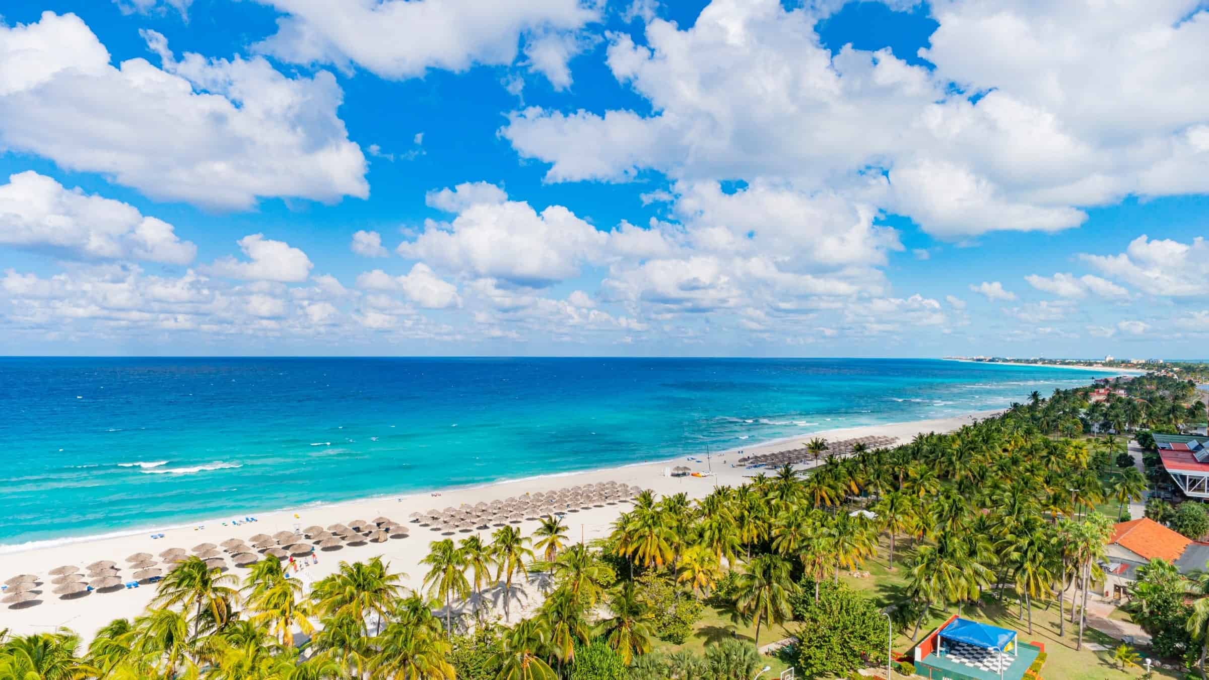 Soft pastel view of Varadero Beach in Cuba with turquoise sea, white sand and palm trees