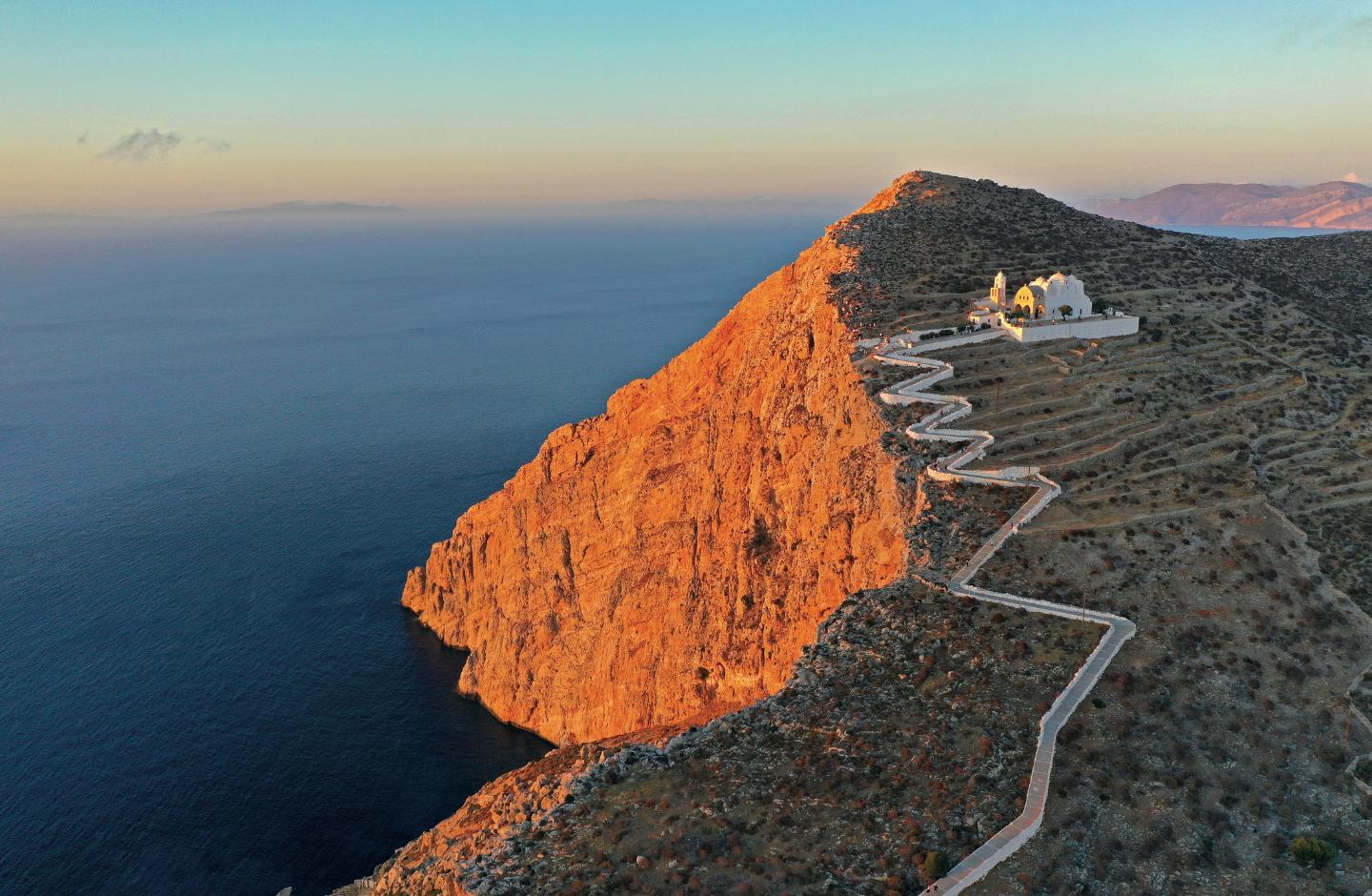 Sunset at the Church of Panagia in Folegandros Church of Panagia above Chora at sunset on Folegandros, Greece