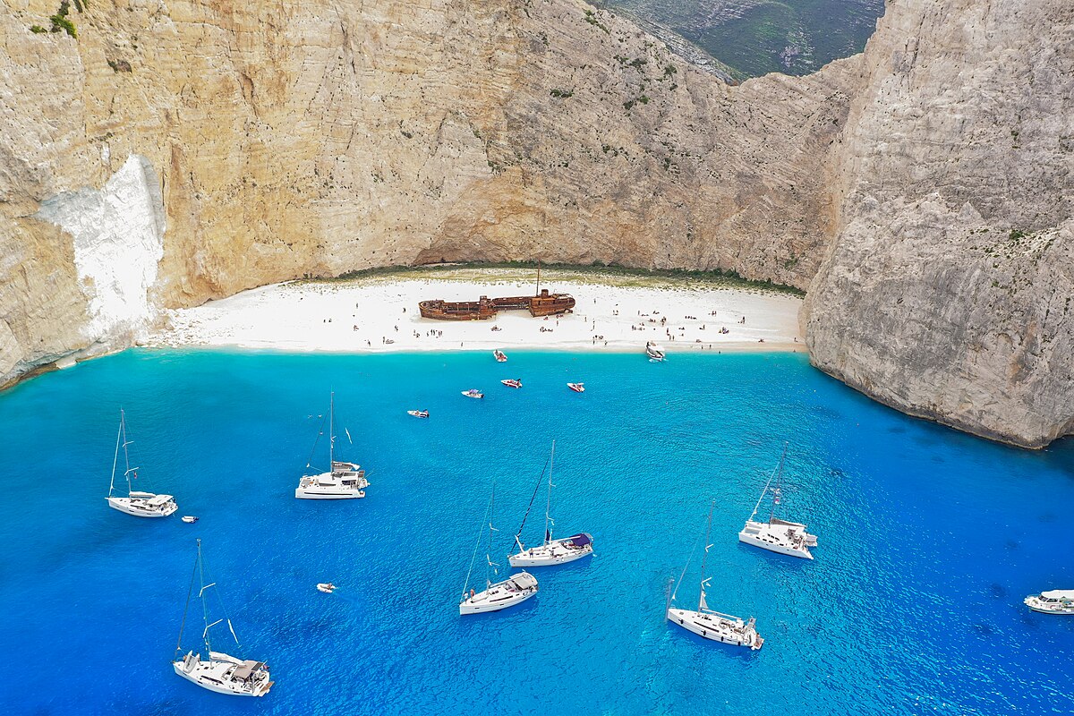 Turquoise waters and dramatic cliffs at Navagio Beach, one of the most famous beaches in Greece