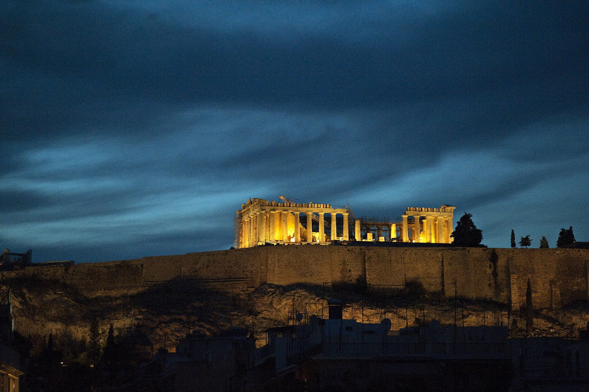 The illuminated Acropolis viewed from Koukaki; this image does not establish a step-free route. The illuminated Acropolis viewed from Koukaki; this image does not establish a step-free route.
