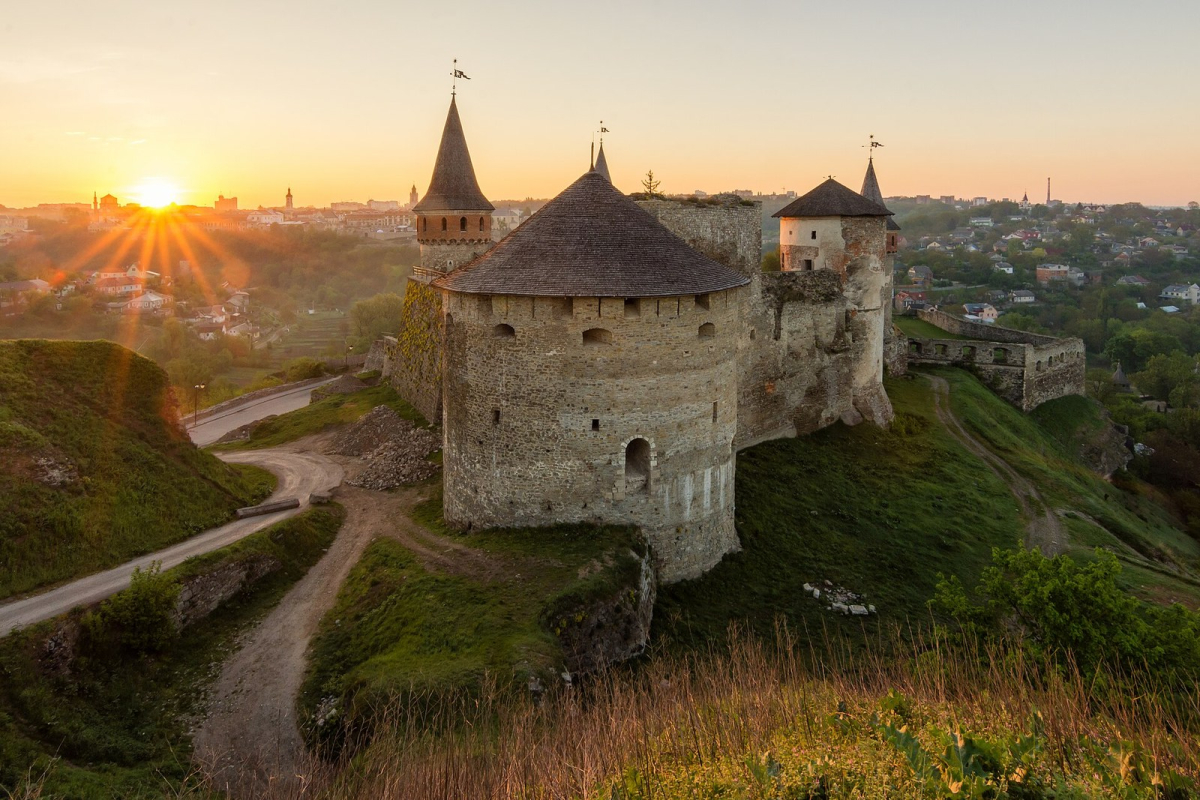 Kamianets-Podilskyi Fortress in low evening sunlight Kamianets-Podilskyi Fortress in low evening sunlight