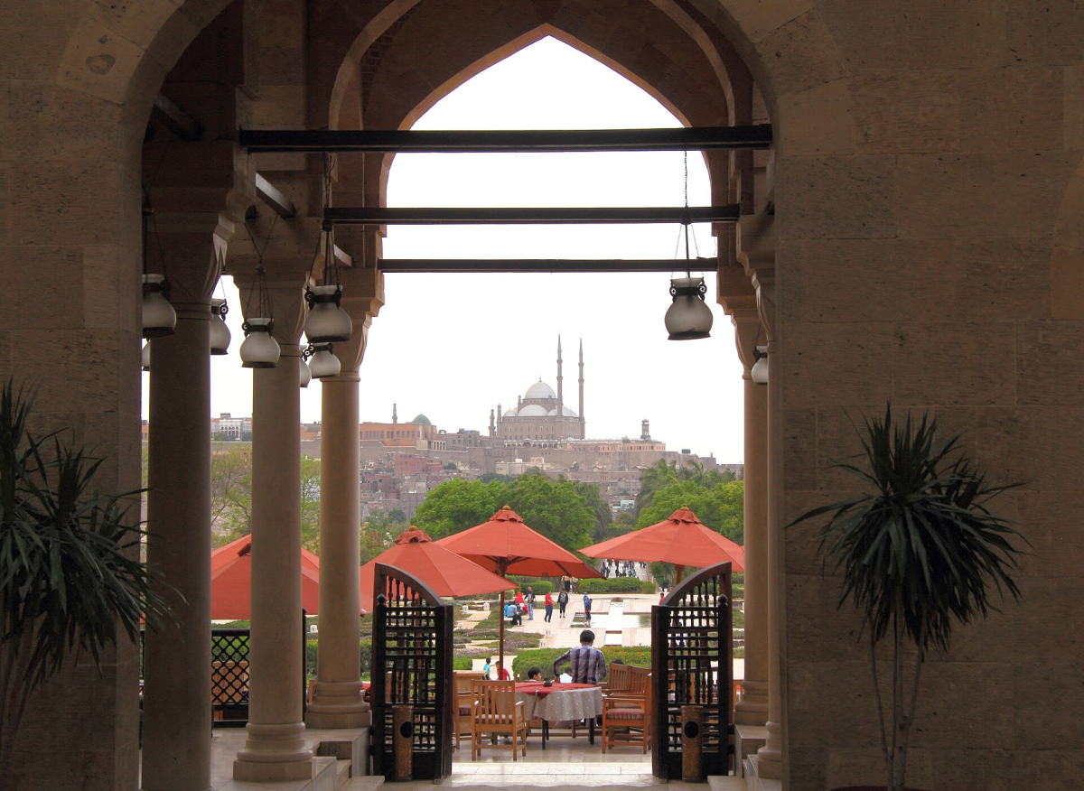 View through an arch in Al Azhar Park toward Cairo View through an arch in Al Azhar Park toward Cairo