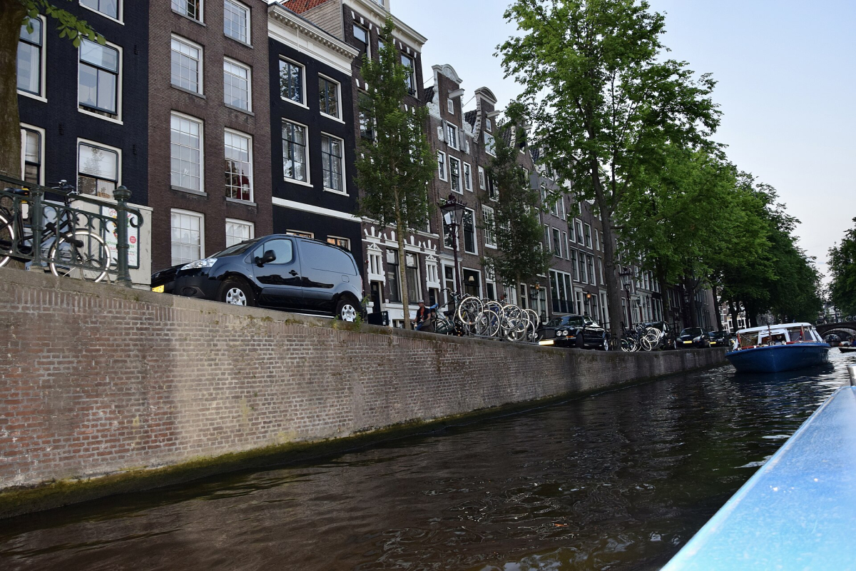 Canal houses and the quay in Amsterdam.