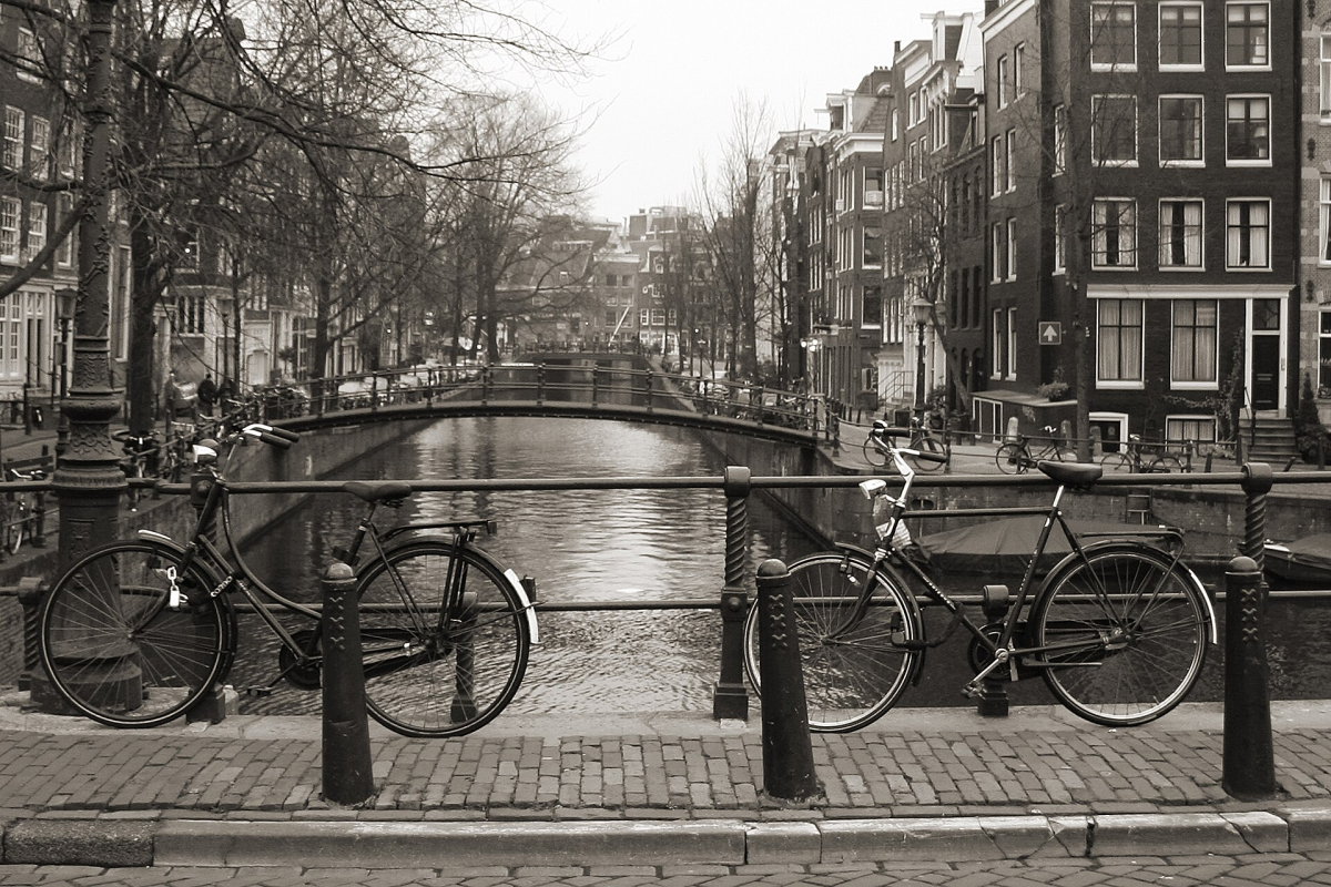 Bicycles beside an Amsterdam canal. Bicycles beside an Amsterdam canal.