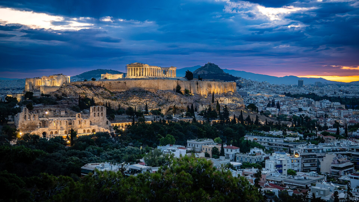 The Acropolis at daybreak above Athens. The Acropolis at daybreak above Athens.