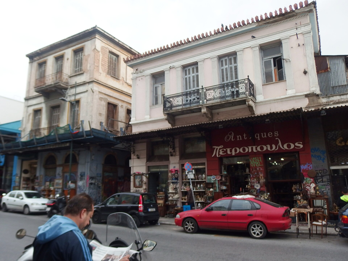 Buildings and traffic on Ermou Street.