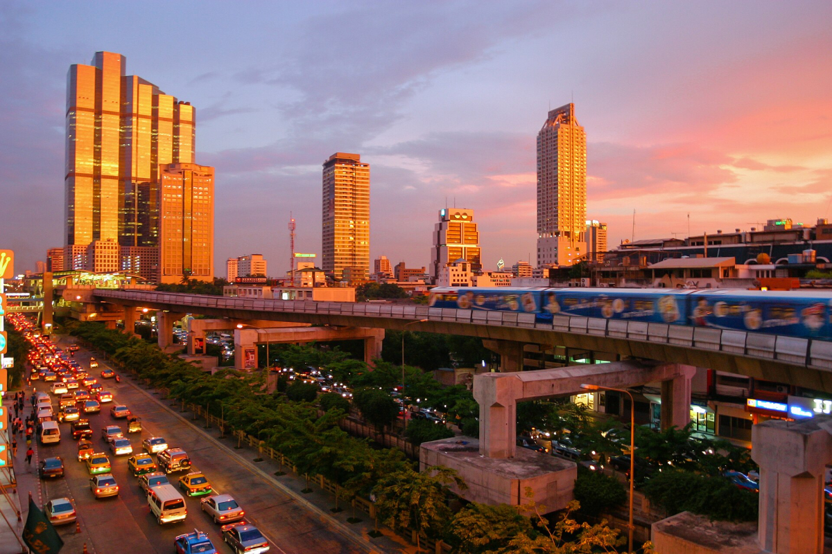 Bangkok Skytrain at sunset. City-transport context, not a room view. Bangkok Skytrain at sunset
