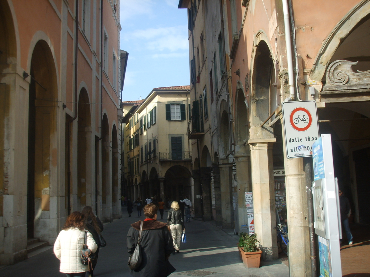 Borgo Stretto and its historic pedestrian setting.