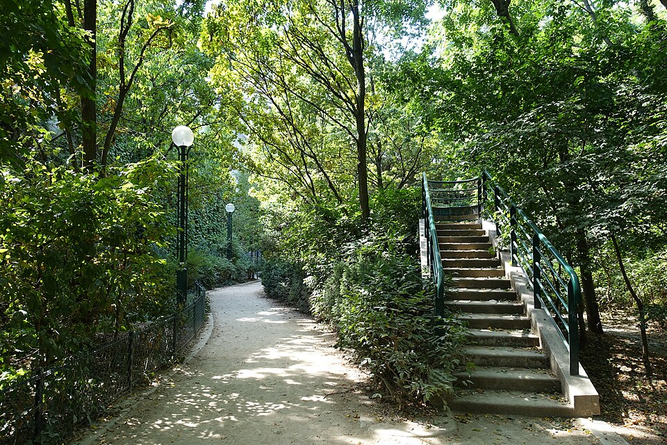 A shaded path and steps on the Coulée verte René-Dumont.