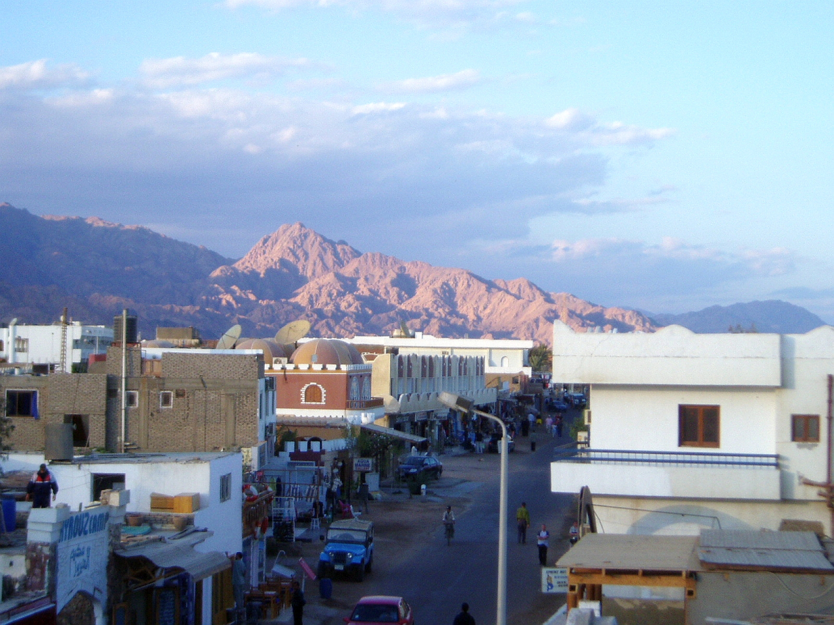 Dahab street with mountains beyond in evening light