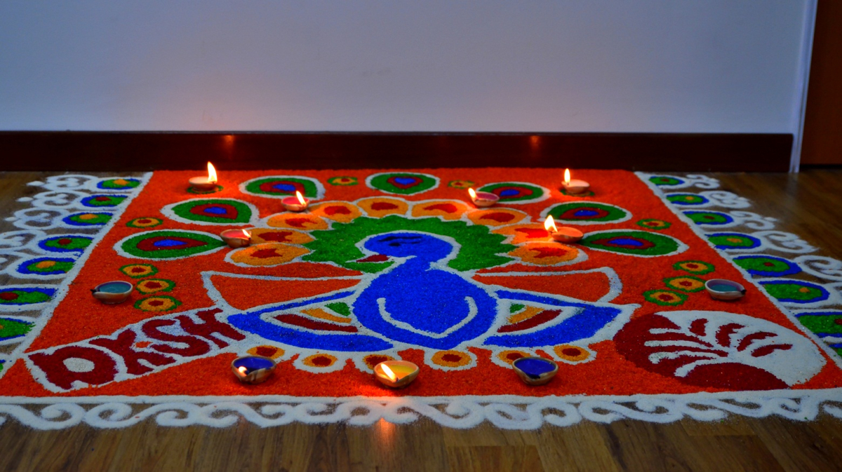 A Deepavali kolam in Malaysia. Respect the design and do not step onto it. A Deepavali kolam in Malaysia. Respect the design and do not step onto it.