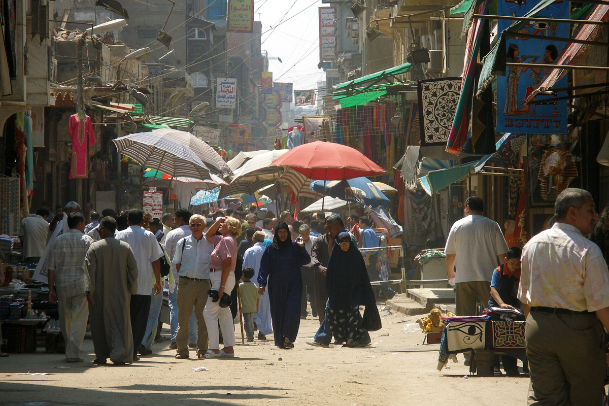 Shops and pedestrians on Al Muizz Street in Cairo Shops and pedestrians on Al Muizz Street in Cairo