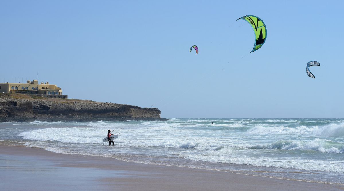 Kitesurfers and waves at Guincho beach