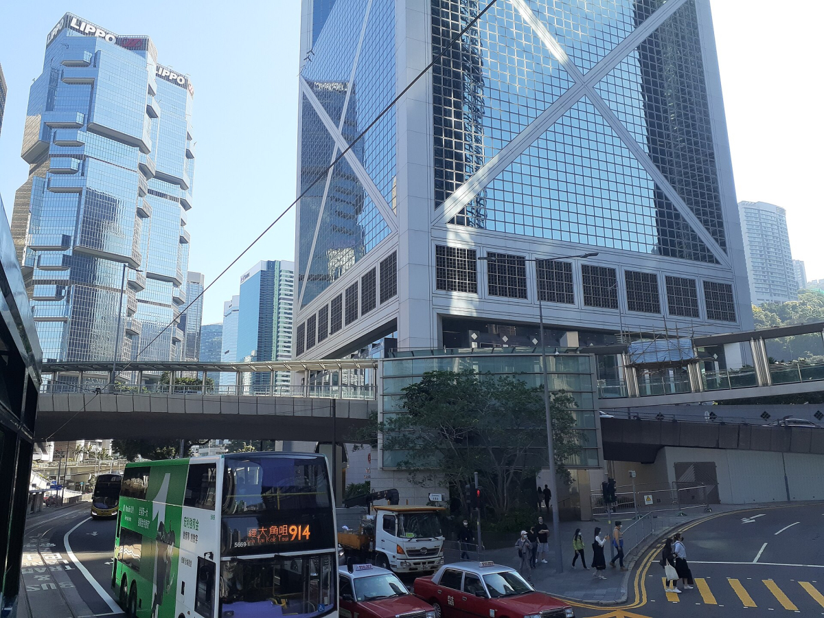 Lower facade of Bank of China Tower beside Hong Kong street traffic Lower facade of Bank of China Tower beside Hong Kong street traffic