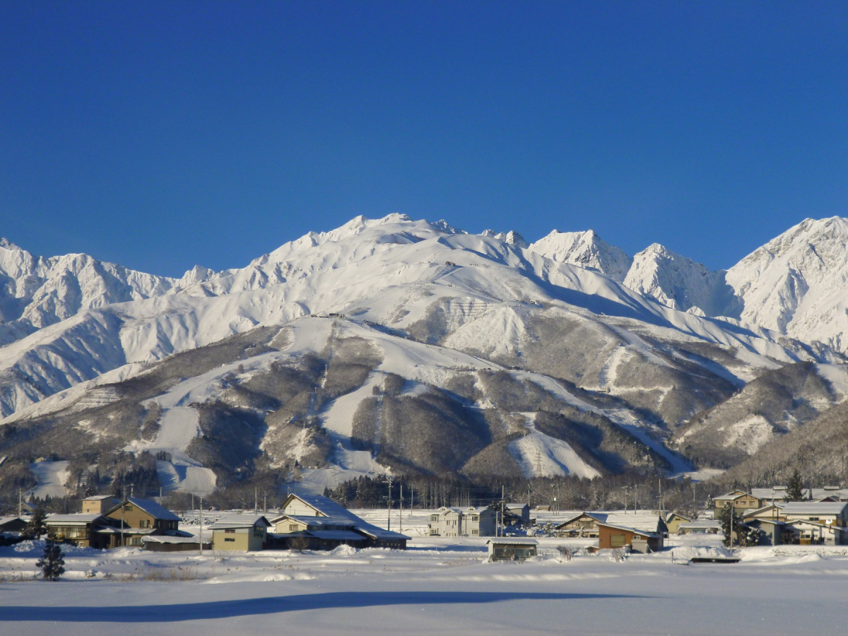 Snow-covered ski slopes and mountain scenery at Hakuba Happo-One