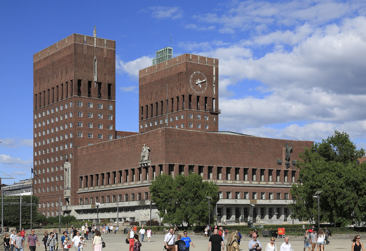 The brick towers and harbour-facing exterior of Oslo City Hall. The brick towers and harbour-facing exterior of Oslo City Hall.