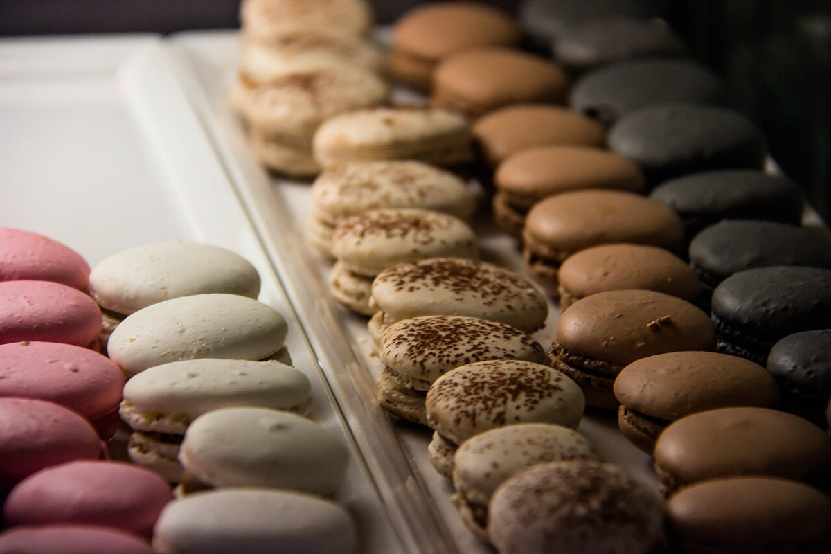 An assortment of macarons, with different coloured shells and fillings.