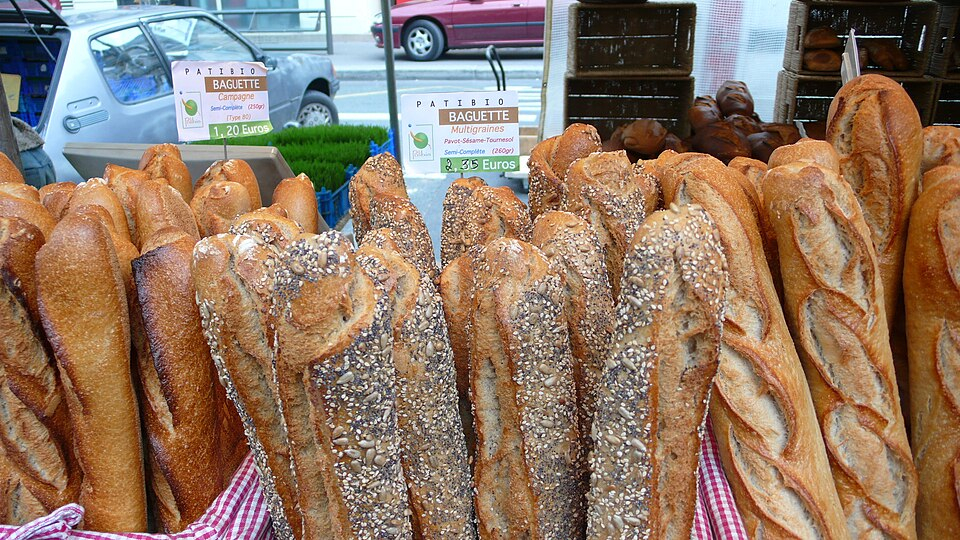 Baguettes on a stall at Marché Raspail; prices and traders change. Baguettes on a stall at Marché Raspail; prices and traders change.