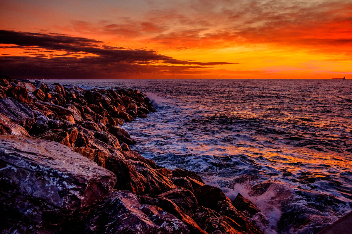 The stony Marina di Pisa seafront at sunset. The stony Marina di Pisa seafront at sunset.