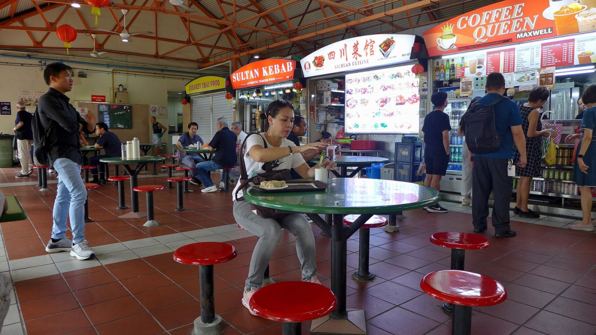Maxwell Food Centre in Singapore; choose a hawker meal around the district you are visiting