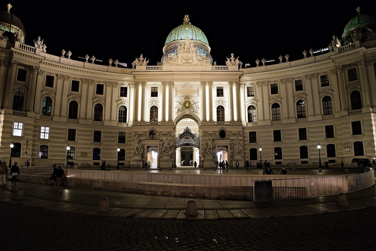The Hofburg entrance at Michaelerplatz after dark