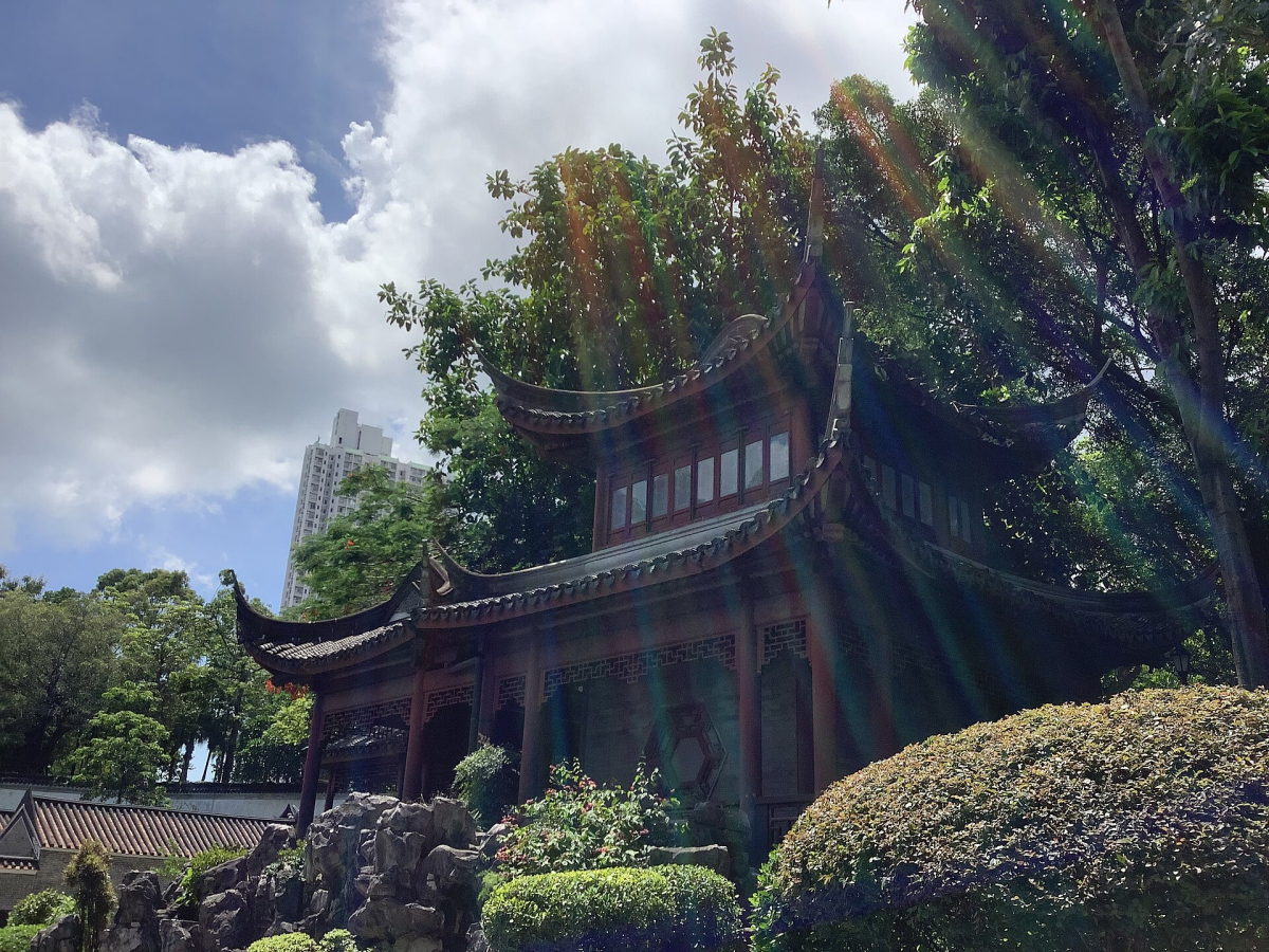 Mountain View Pavilion and greenery in Kowloon Walled City Park.