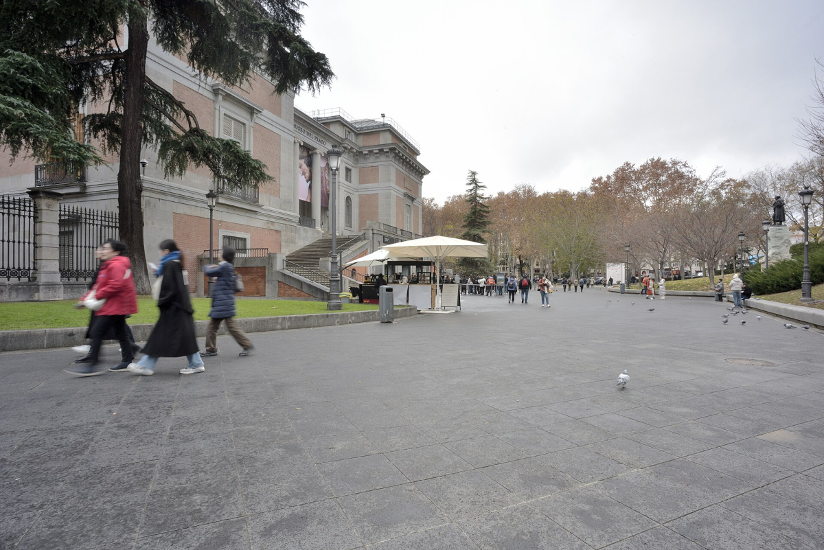The Prado Museum exterior and its pedestrian approach.
