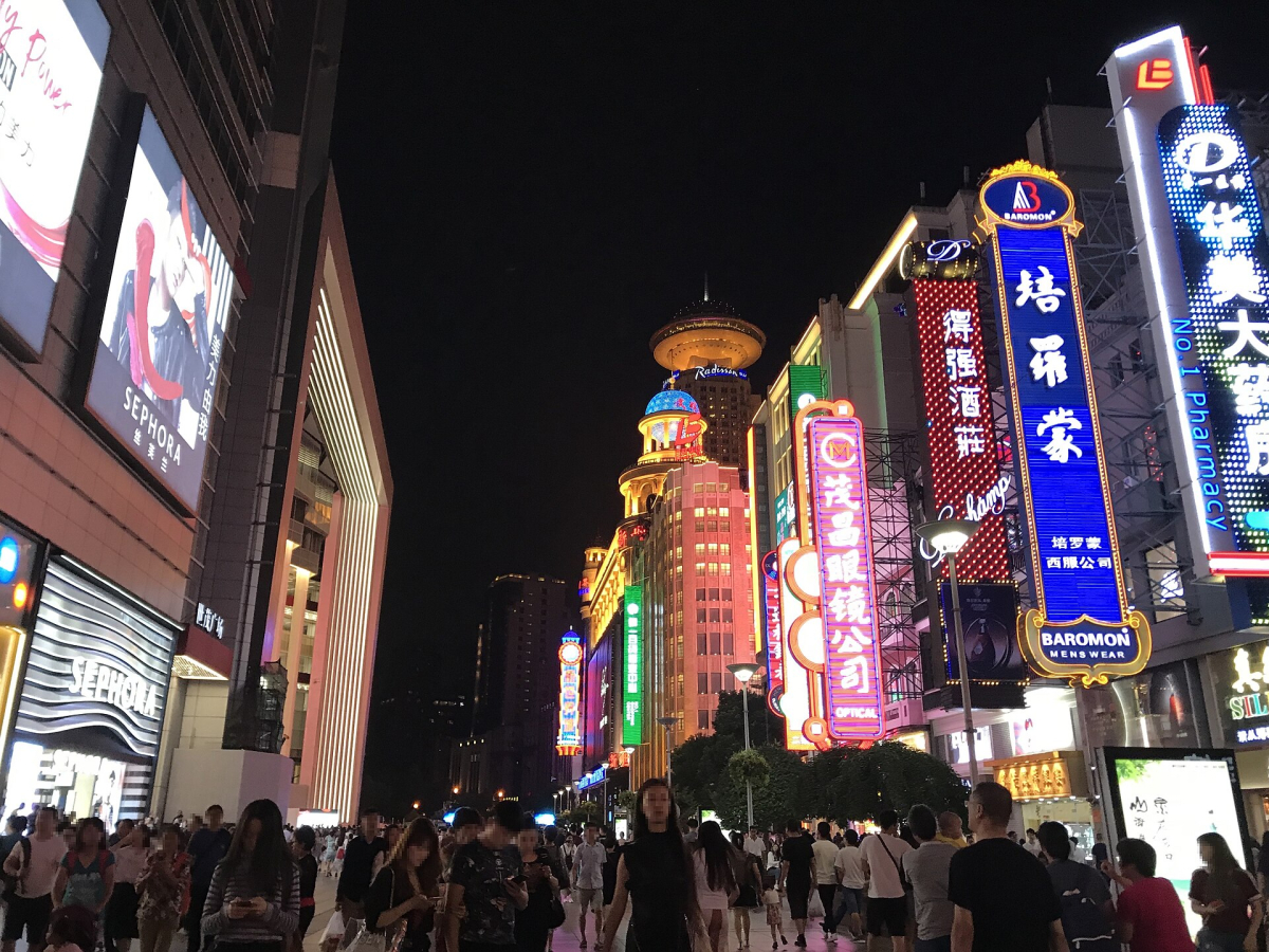 Street signs and buildings in Shanghai
