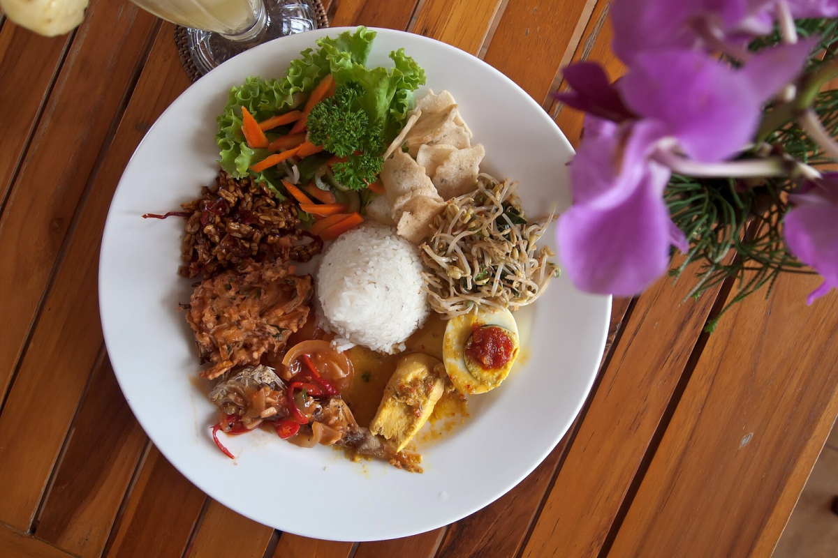 A nasi campur plate photographed in Ubud