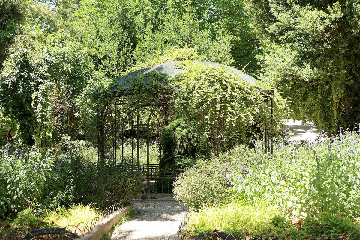 A shaded garden structure in the National Garden. A shaded garden structure in the National Garden.