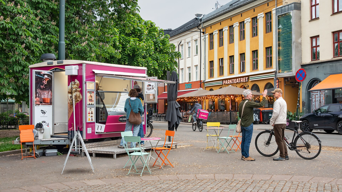 A street scene in Grünerløkka in June 2026, showing everyday neighbourhood life beyond the central waterfront. A street scene in Grünerløkka in June 2026, showing everyday neighbourhood life beyond the central waterfront.