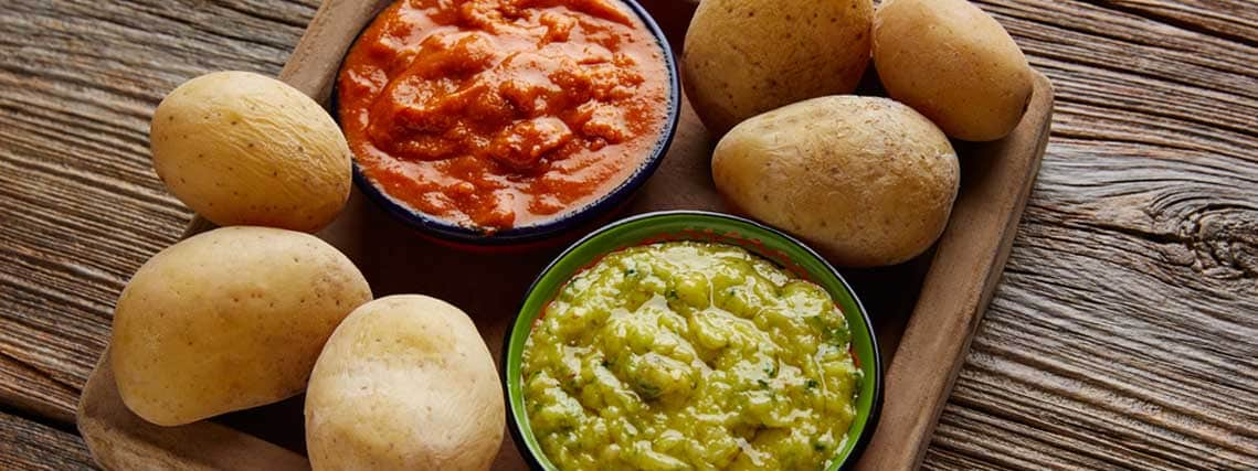 Papas arrugadas with red and green mojo sauces from the Canary Islands