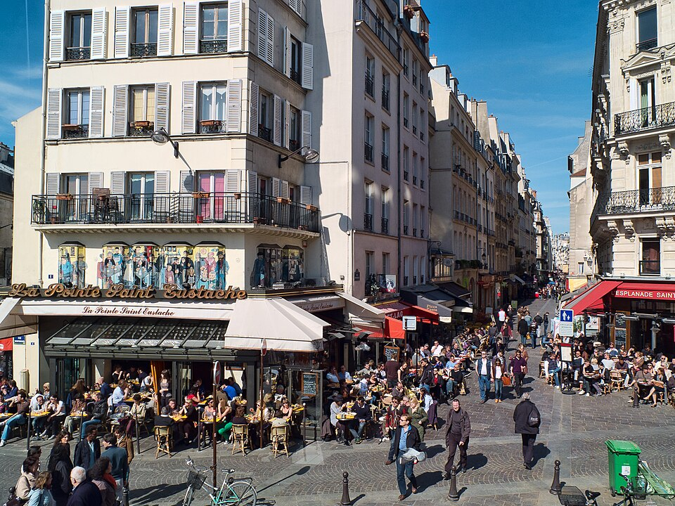 Cafés and shops along the pedestrian Rue Montorgueil.
