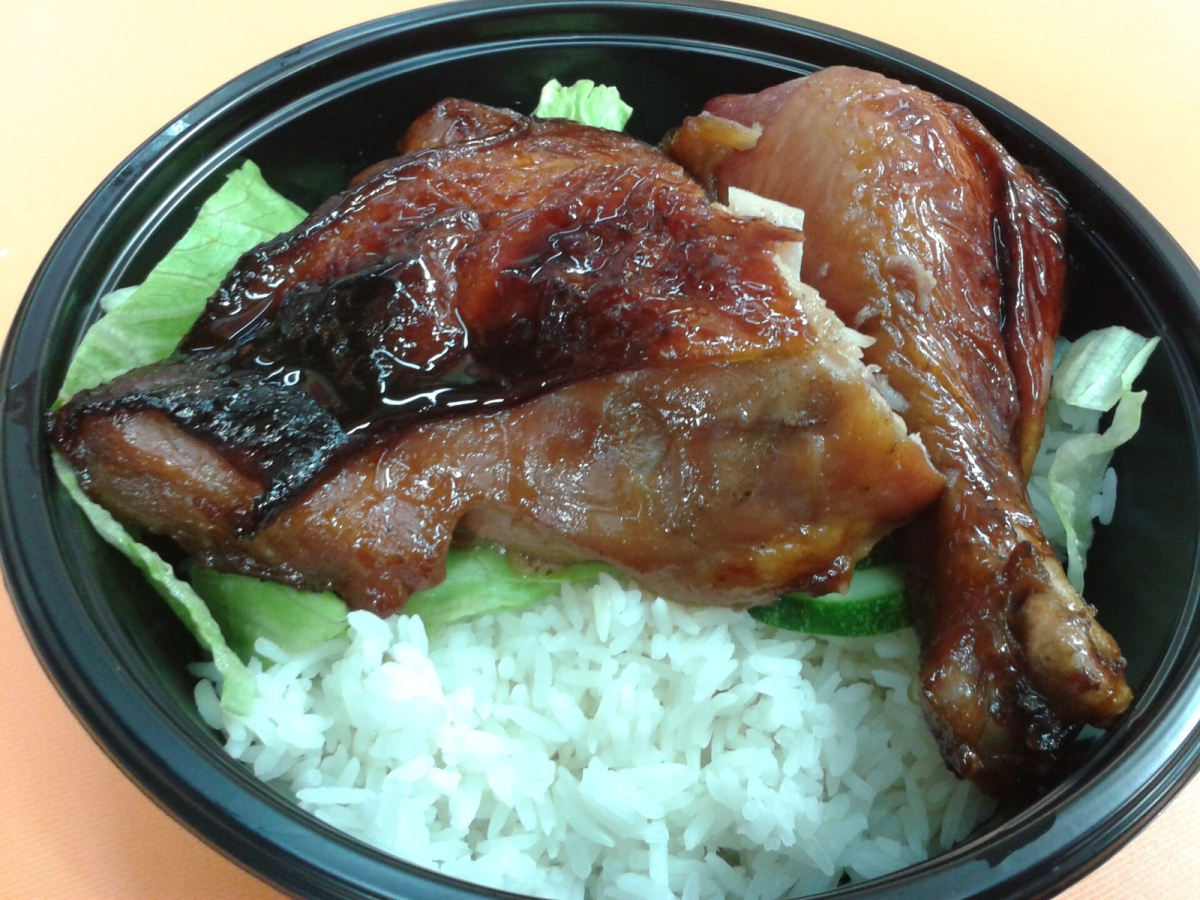 Roast chicken and rice. Illustrative dish photograph; preparation varies by stall. Roast chicken and rice