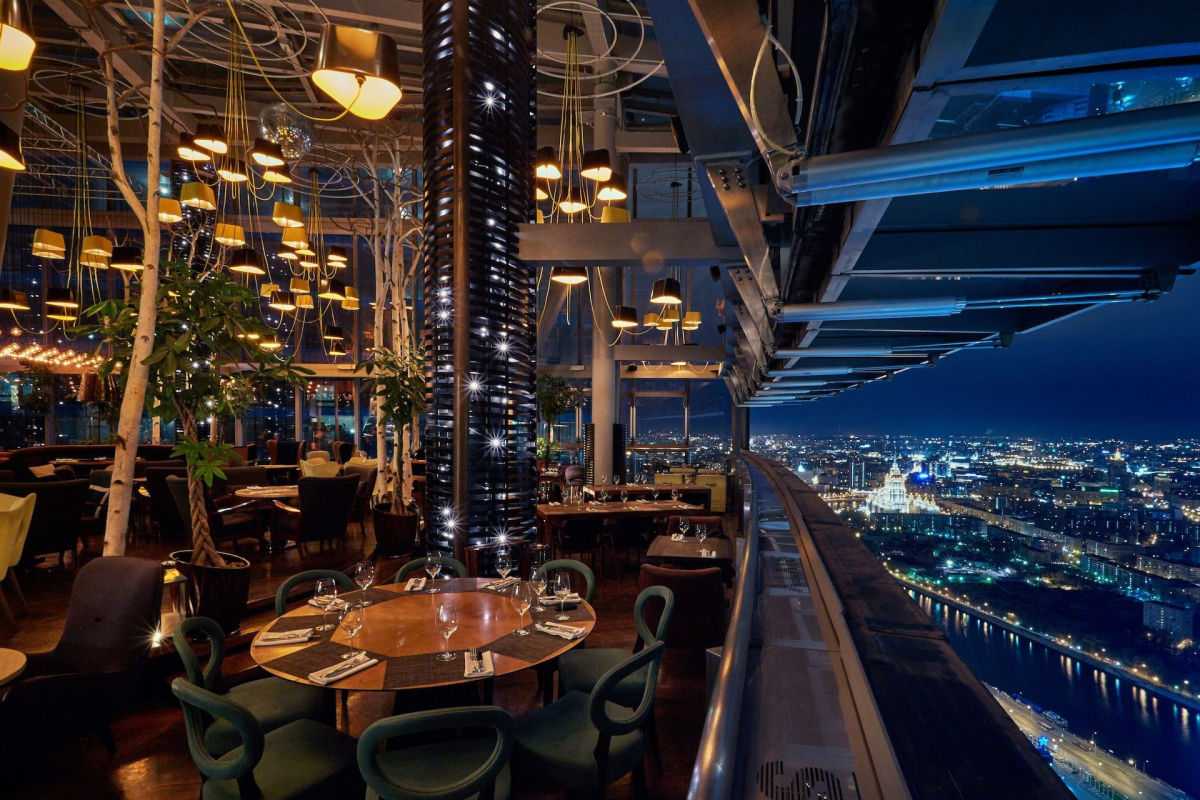 Rooftop bar overlooking Moscow city lights
