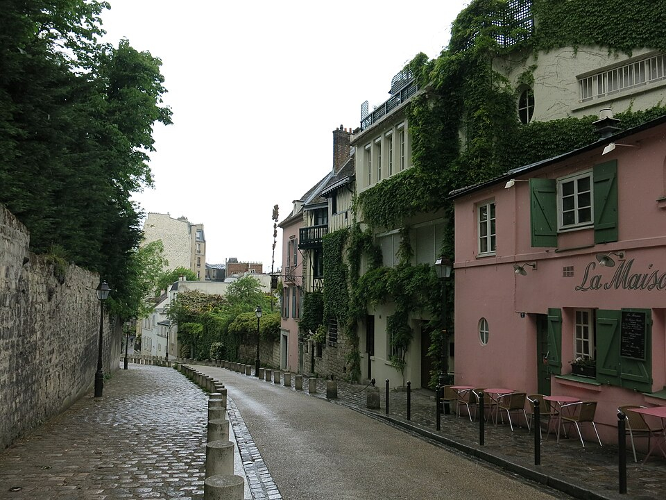 The cobbled Rue de l’Abreuvoir and La Maison Rose in Montmartre. The cobbled Rue de l’Abreuvoir and La Maison Rose in Montmartre.