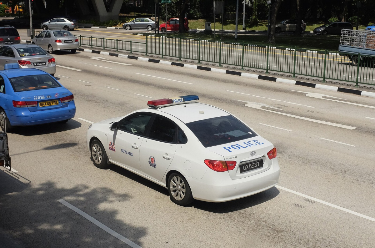 Singapore Police Force Geylang NPC patrol car, photographed in 2014. Historical illustration; use current official contact channels for assistance. Singapore Police Force Geylang NPC patrol car, photographed in 2014