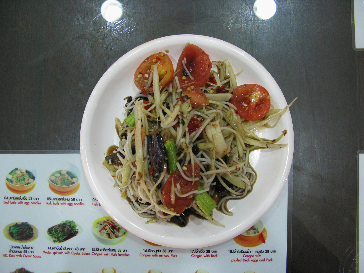 Som tam green papaya salad in Bangkok. Illustrative dish photograph. Som tam green papaya salad in Bangkok