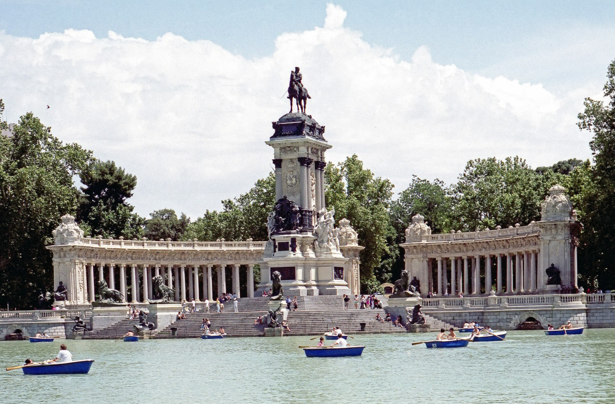 The monument to Alfonso XII beside the lake in Retiro Park.