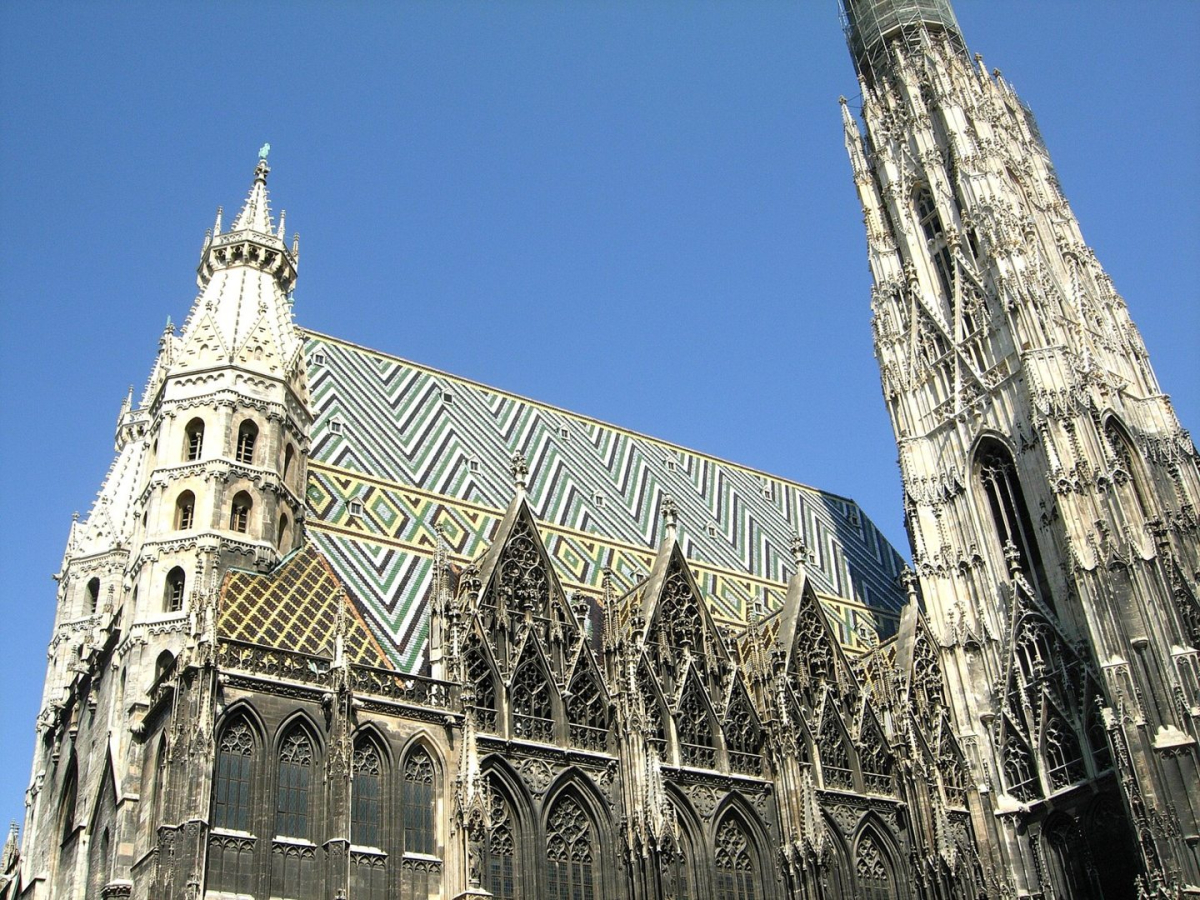 The patterned roof and tower of St. Stephen’s Cathedral The patterned roof and tower of St. Stephen’s Cathedral