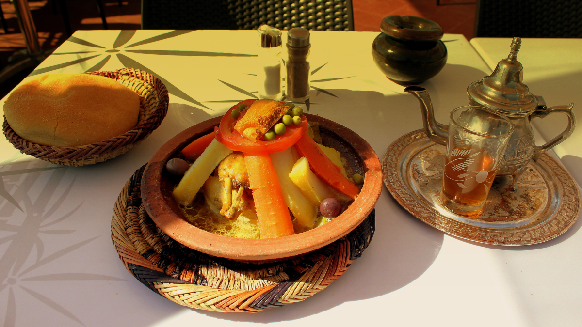 Chicken-and-vegetable tagine with bread and mint tea in Marrakech Chicken-and-vegetable tagine with bread and mint tea in Marrakech